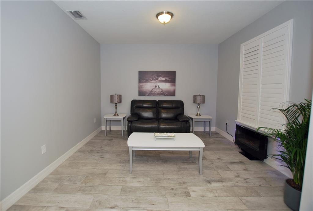 As you enter, to your right is the formal Living Room.