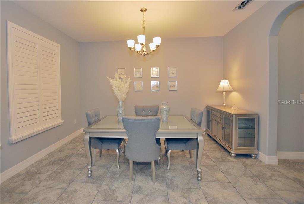 As you enter, to your left is the formal Dining Room.