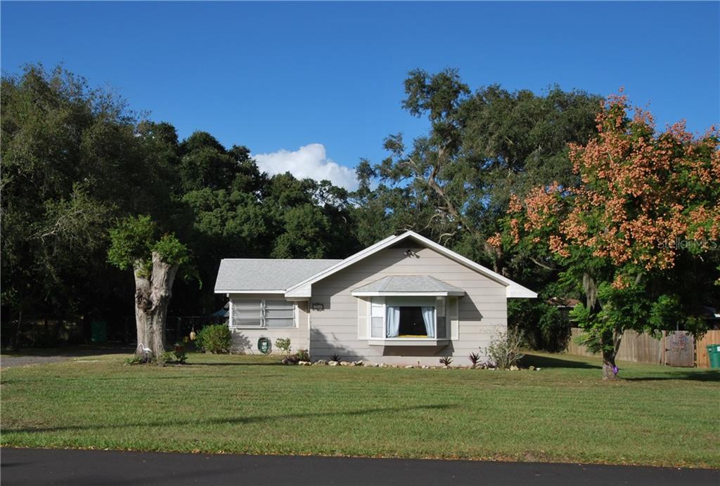 Here it is! Beautiful and spacious home with many mature and flowering plants.