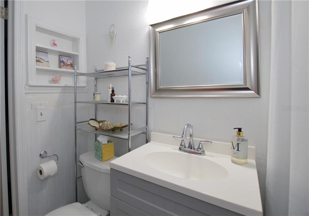 Guest Bath with more built-in shelves.