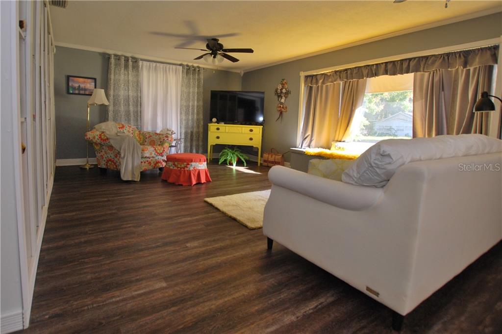 Large and Living Room with a Bay window to let in the Florida sunshine.
