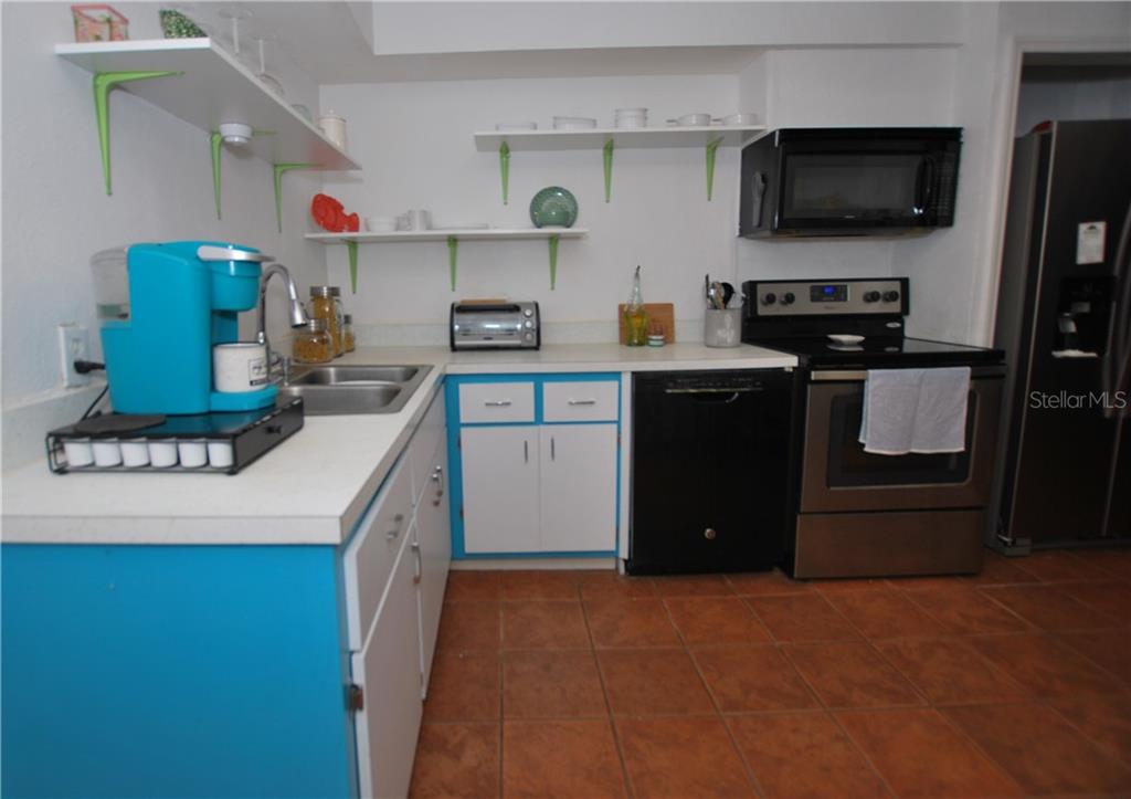 Delightfully vibrant with a recently purchased refrigerator.