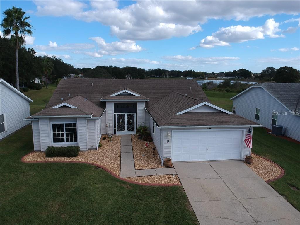 TASTEFULLY LANDSCAPED EXTERIOR FRONT