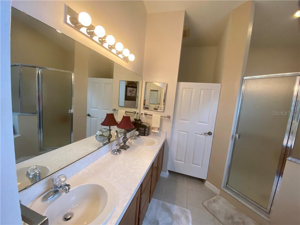 MASTER BATH COMPLETE WITH DOUBLE SINK VANITY PLUS PRIVATE AREA FOR COMMODE