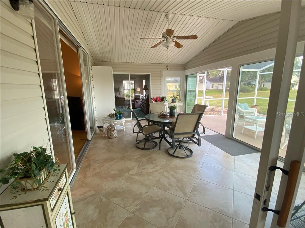 BEAUTIFUL LANAI WITH HIGH END THERMAL DOUBLE PANED SLIDING DOORS AND EXTRA SIDE WINDOW