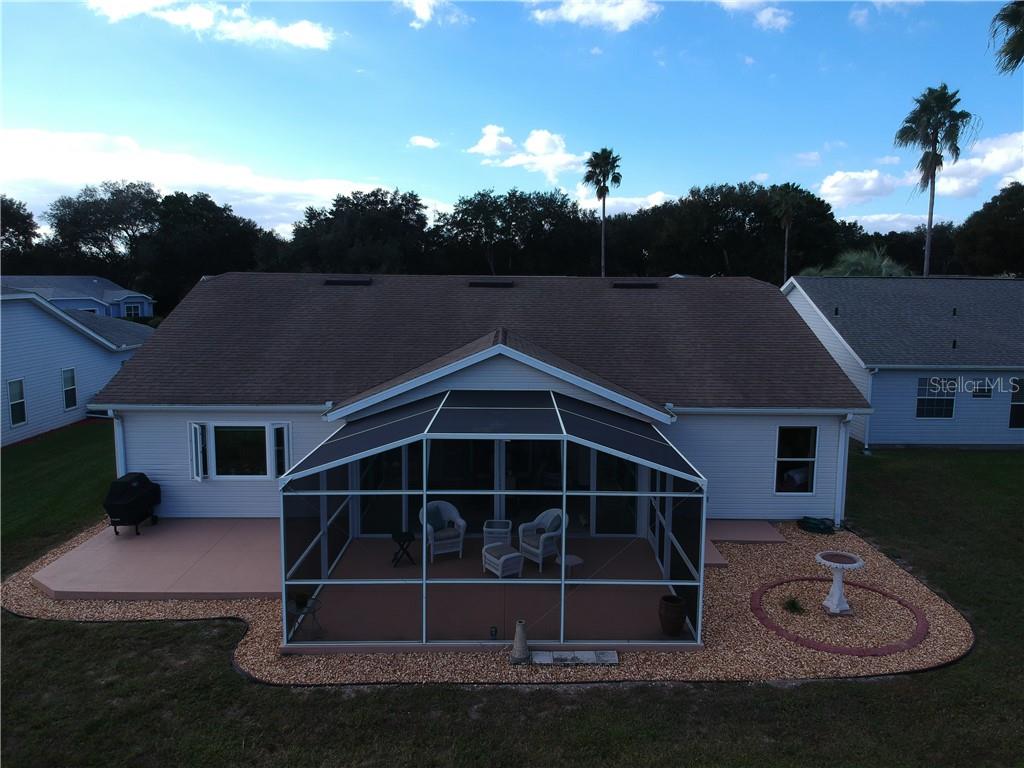 REAR VIEW.  NOTICE HOW NEAT AND PRISTINE THE LANDSCAPING IS.