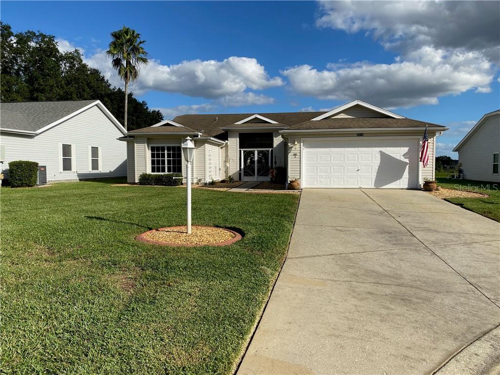 LONG DRIVEWAY LEADING TO HOME