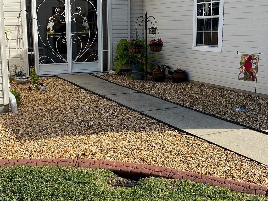 BEAUTIFUL CURBING AND EASY TO CARE FOR LANDSCAPING