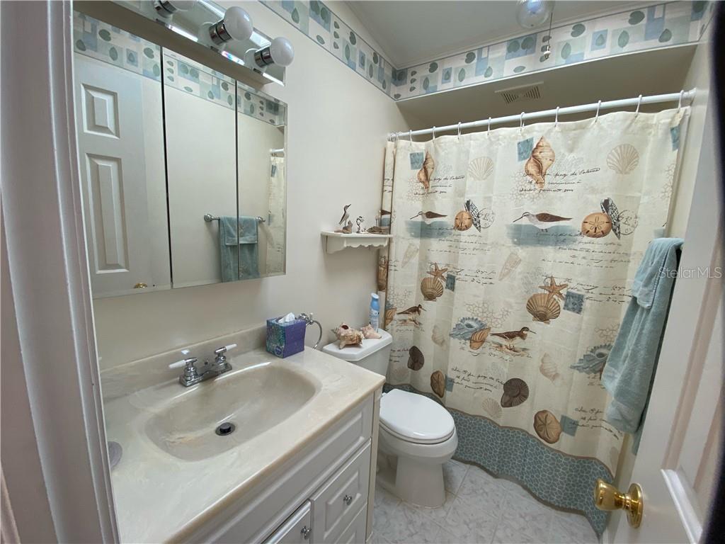 TASTEFULLY DECORATED GUEST BATH