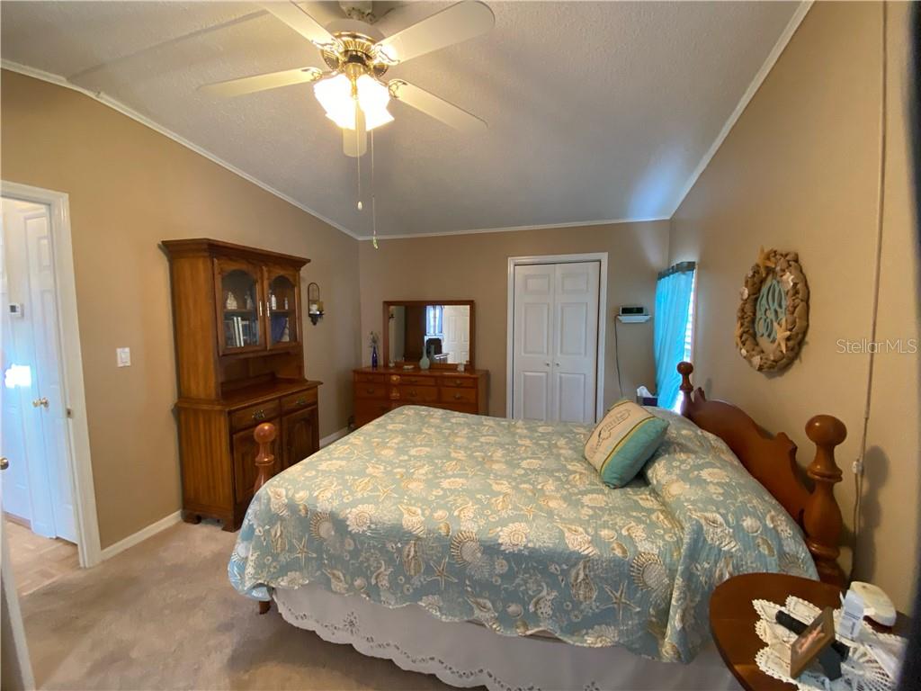 NICE BEDROOM FURNITURE AND A WALK IN CLOSET