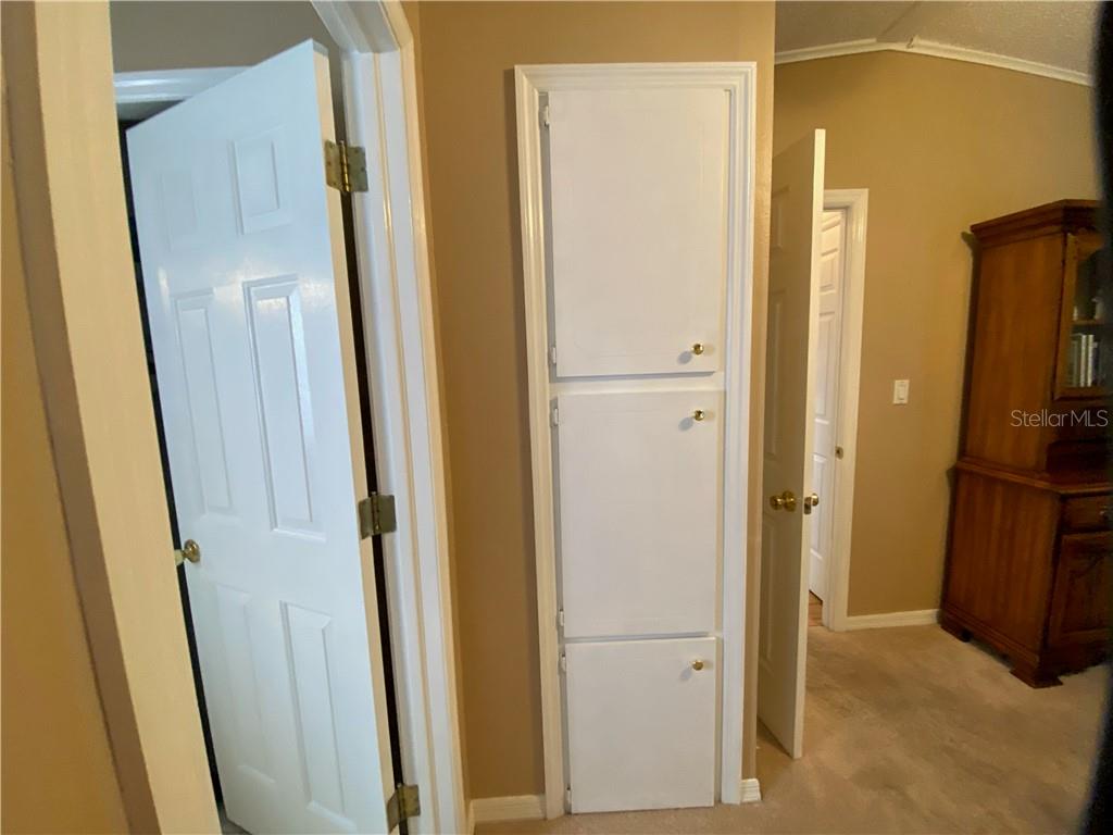 EXTRA BUILT IN LINEN CLOSET IN MASTER BEDROOM