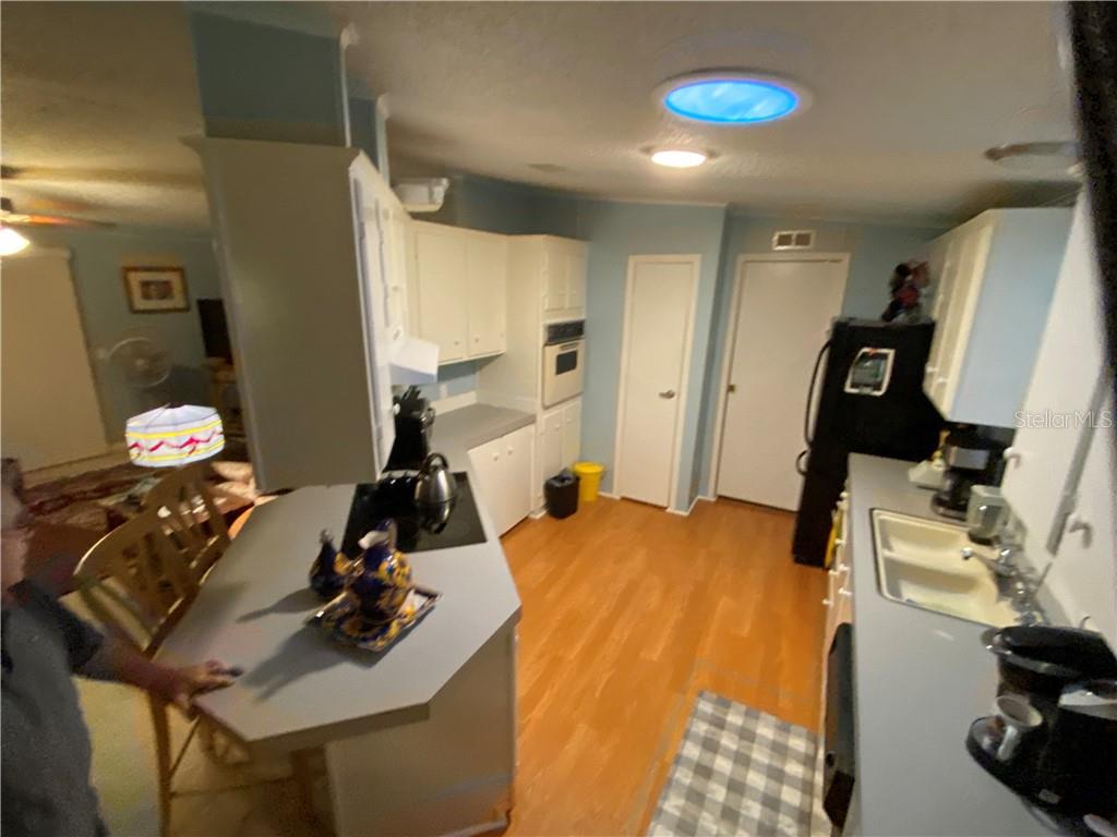 NICE LAMINATE FLOORING IN KITCHEN