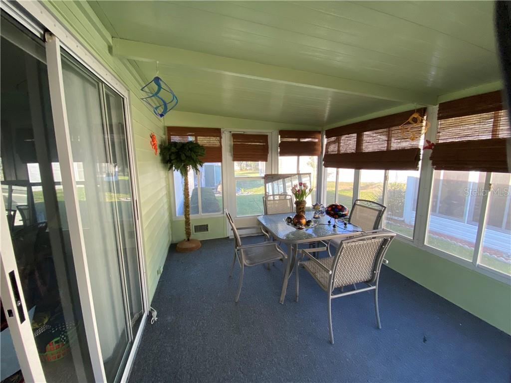 NICE SLIDING GLASS DOORS FROM LIVING ROOM INTO LANAI