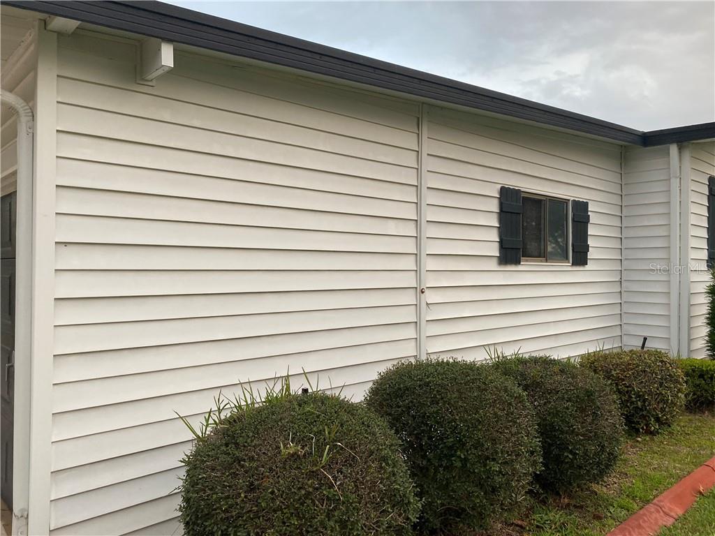 SIDE VIEW OF GOLF CART GARAGE AND STORAGE AREA