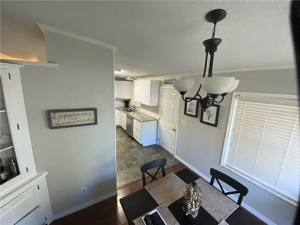 DINING ROOM LEADING INTO KITCHEN
