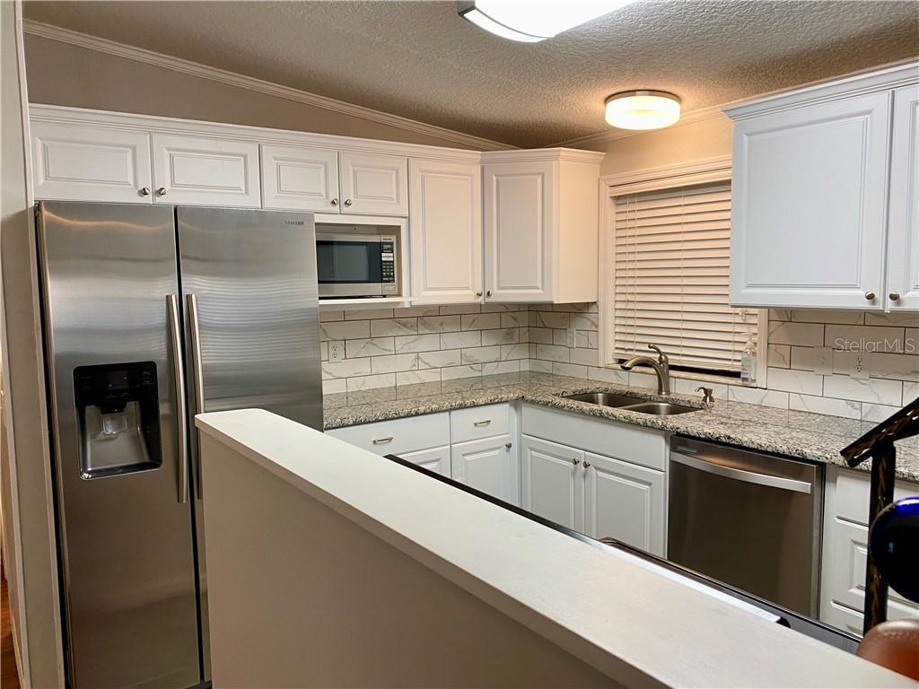 NOTICE THE TASTEFUL BACKSPLASH