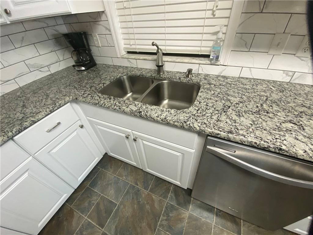 LOVELY GRANITE COUNTERTOPS AND UNDERCABINET SINK