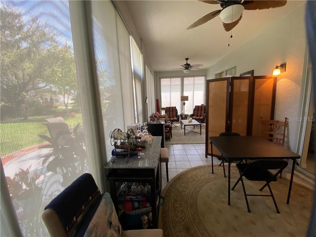 BEAUTIFUL WINDOW TREATMENTS IN LANAI FOR PRIVACY WHILE ENJOYING THE GORGEOUS OUTSIDE VIEWS