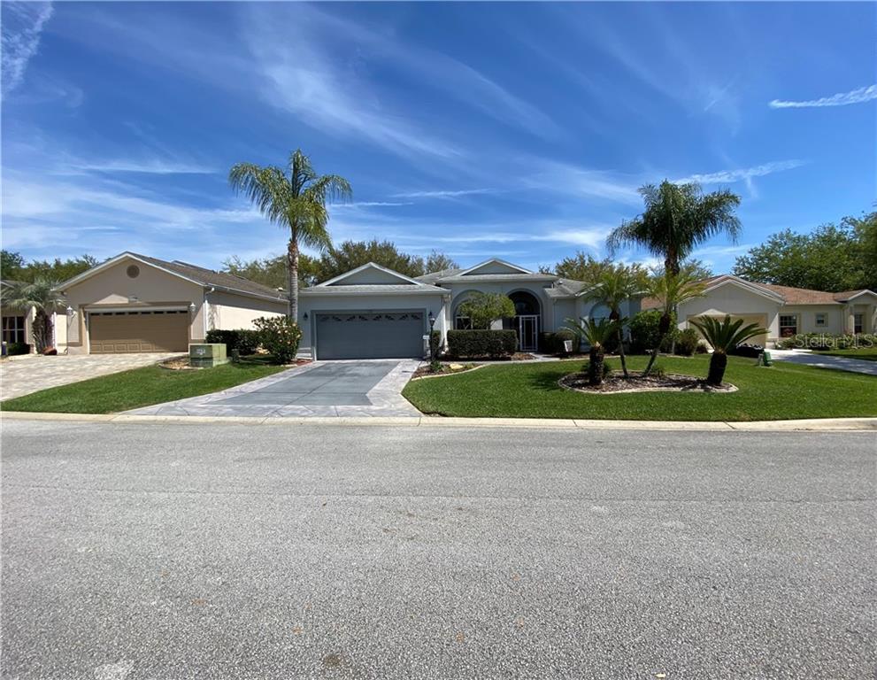 NOTICE THE WELL PLACED PALM TREES