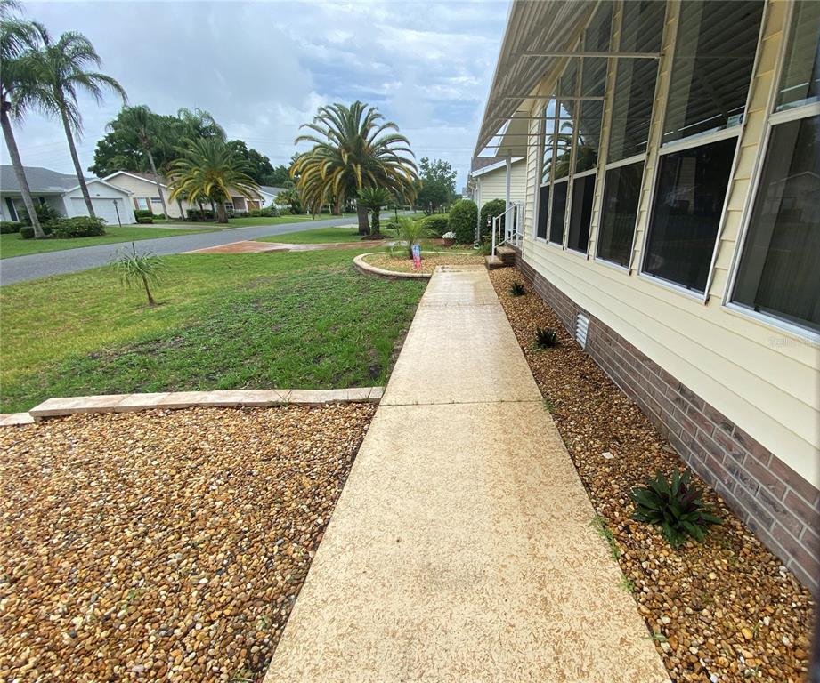FRONT SIDEWALK LEADING TO FRONT DOOR