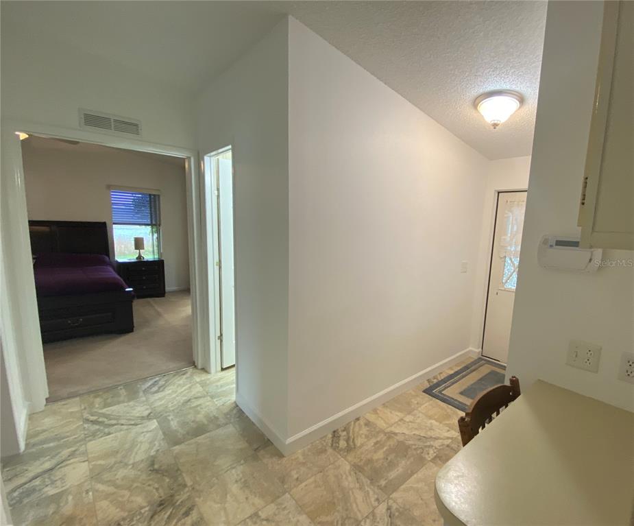 PRETTY NEUTRAL VINYL FLOORING IN HALLWAY