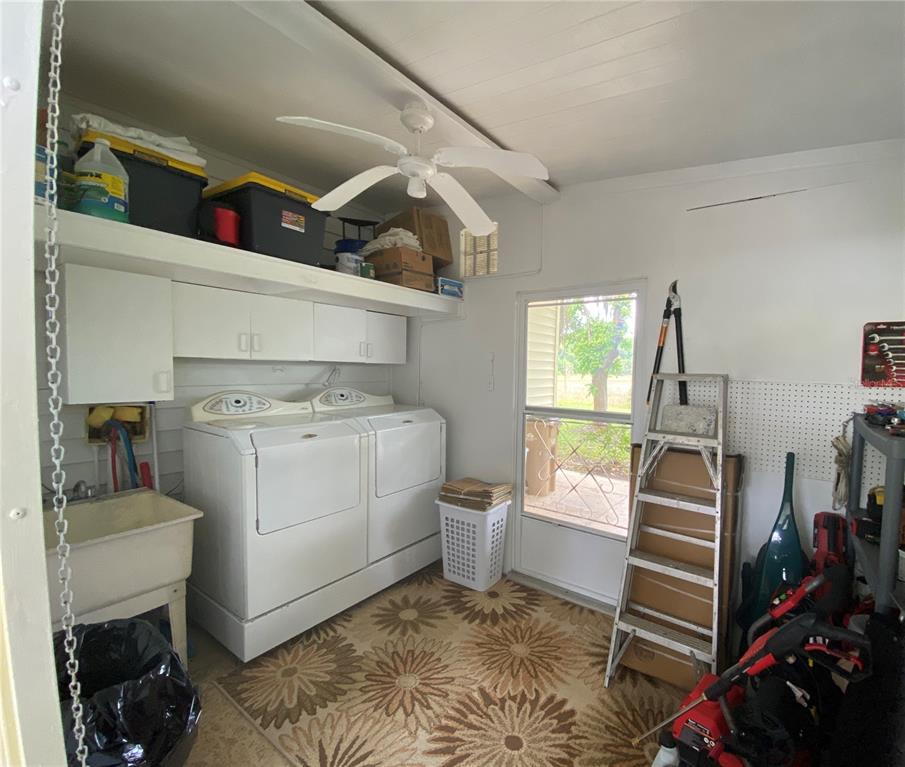 LARGE GOLF CART GARAGE AND LAUNDRY CORNER