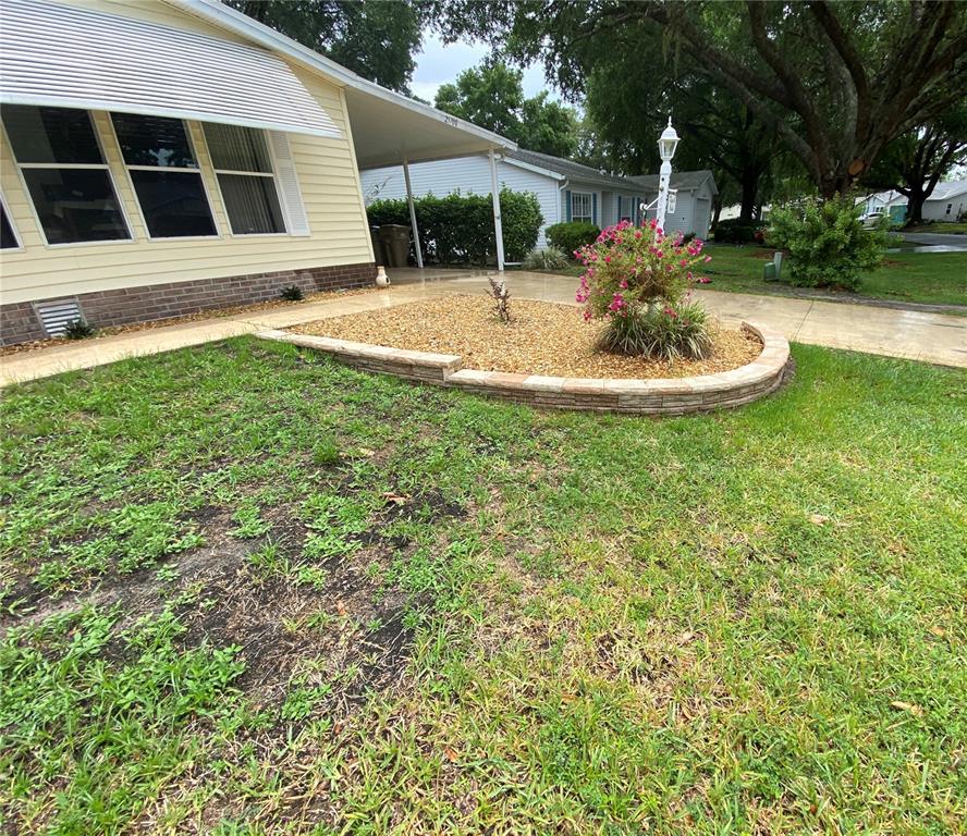 NEAT WALL AROUND LANDSCAPING