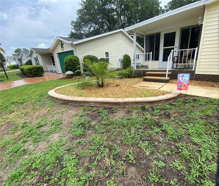 MORE LANDSCAPING AND FRONT PORCH VIEWS