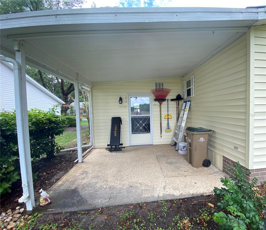 PRIVATE BACK COVERED PATIO OFF GOLF CART GARAGE