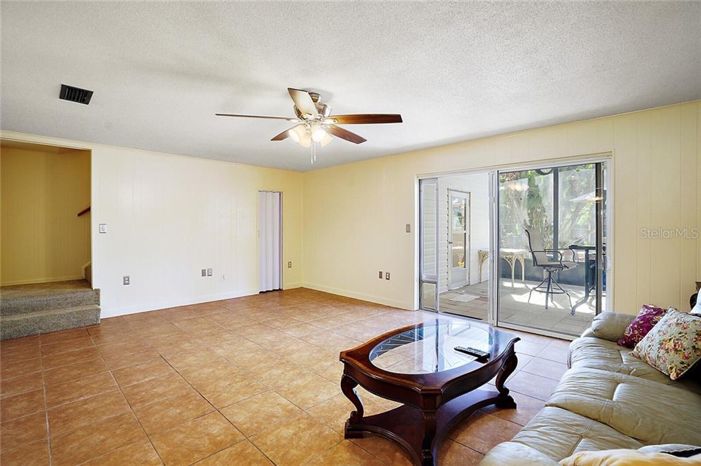 From Living Room: Steps to large Master Bathroom, Walk-in Closet (center), Sliders to your 