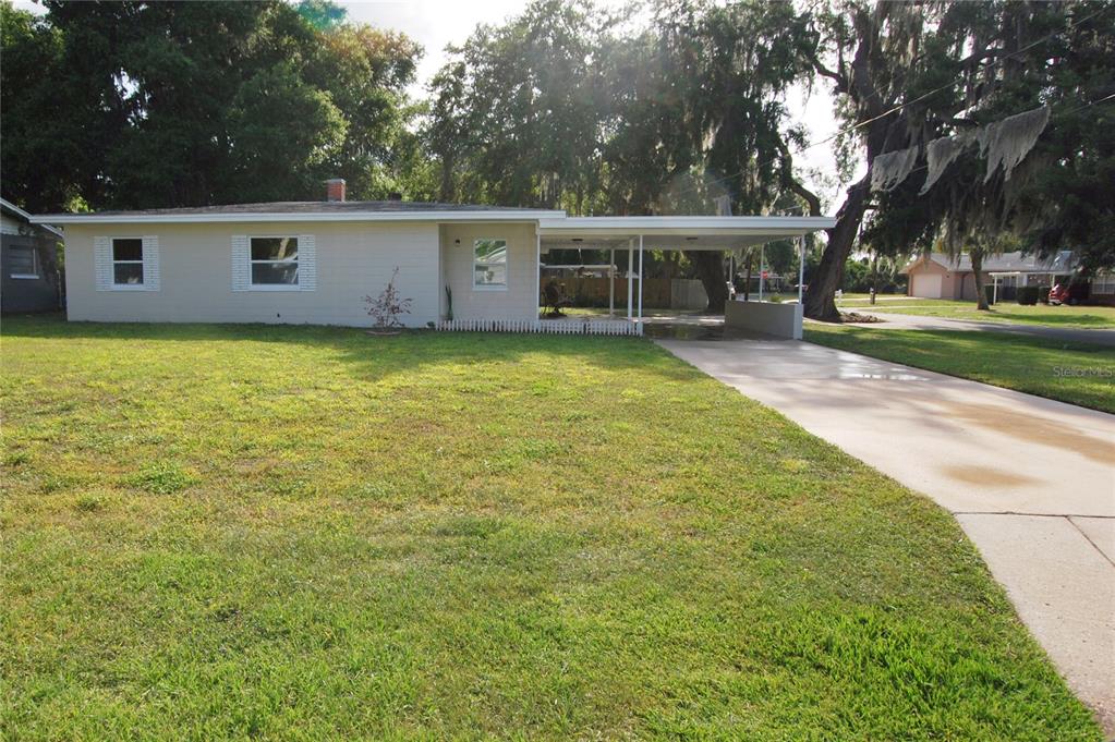 New windows, newly painted, new landscaping and what a lawn!