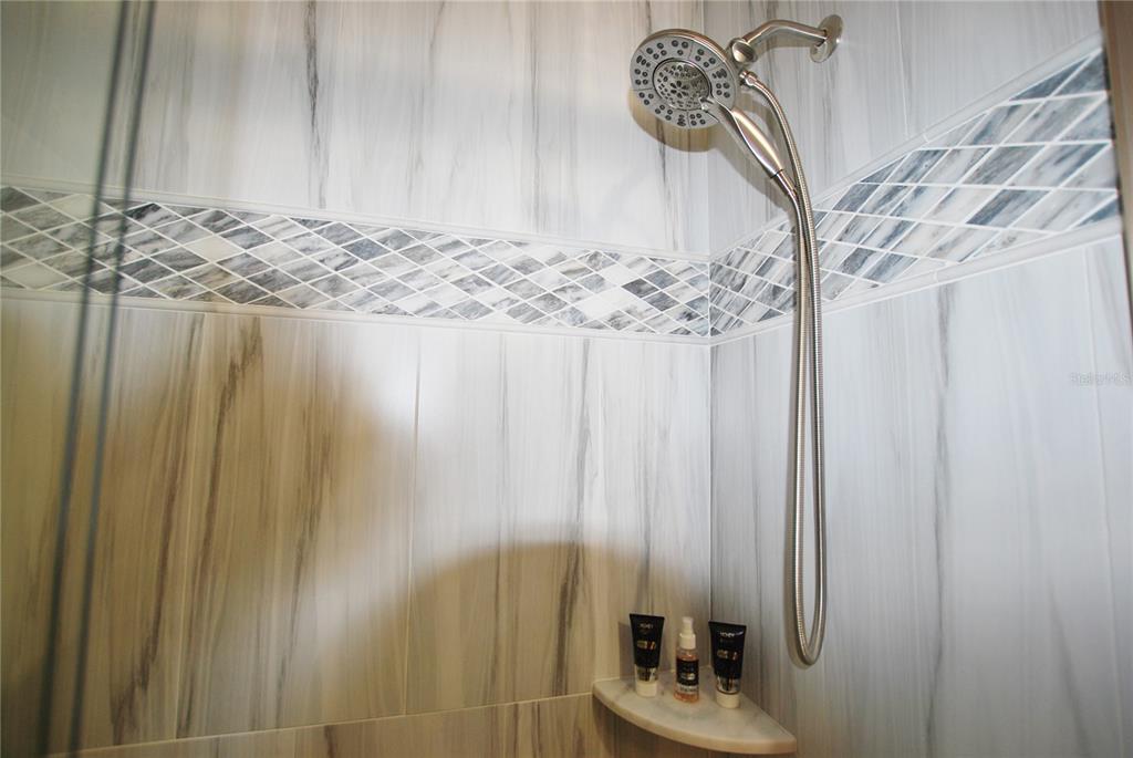 Stunning luxury tile and marble in Guest Bathroom.