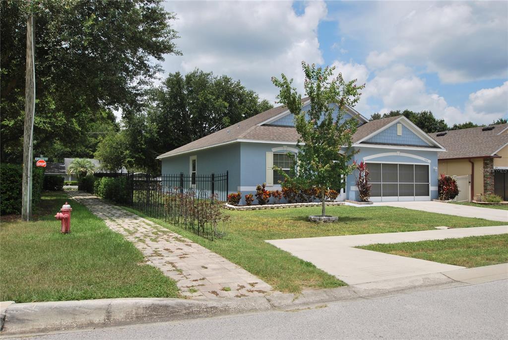 Gorgeous corner house with sidewalks all around.