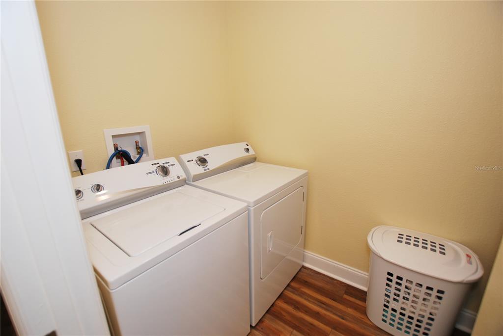 Laundry Room with Washer and Dryer that convey.