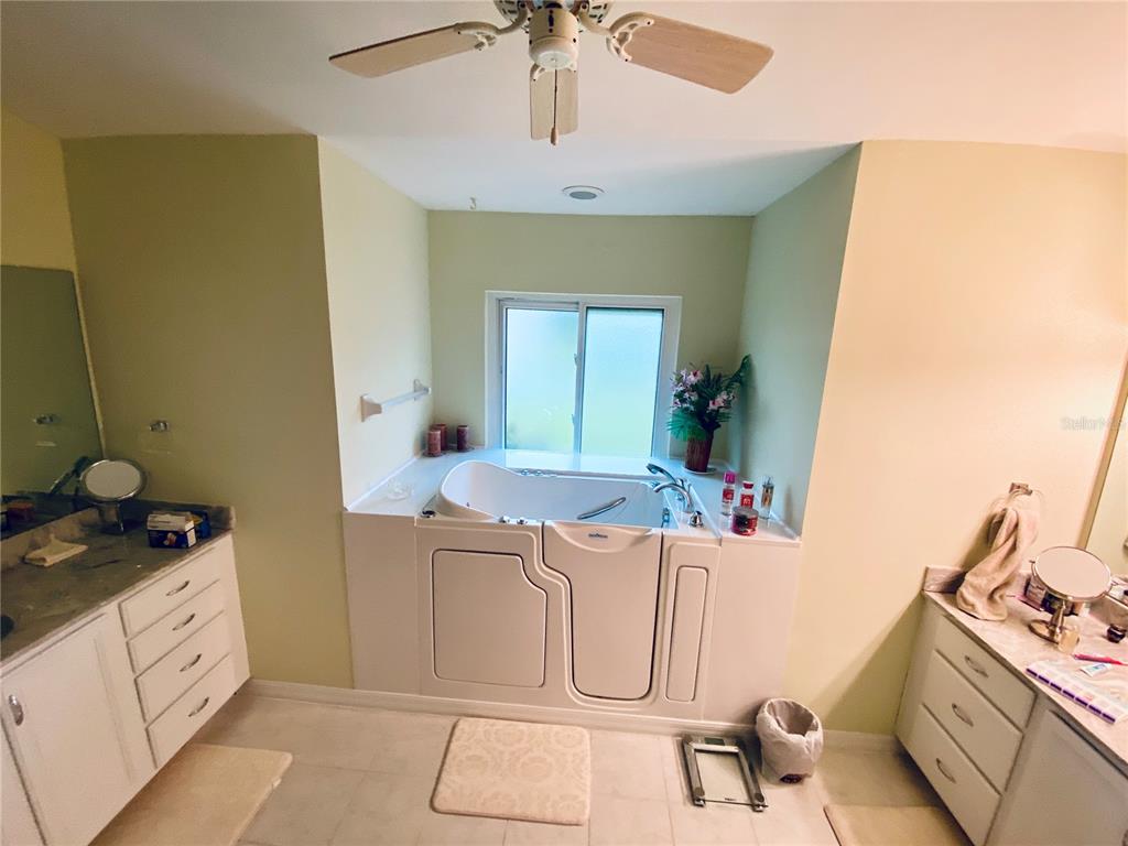 WALK IN TUB AND SEPARATE VANITIES IN MASTER BATH