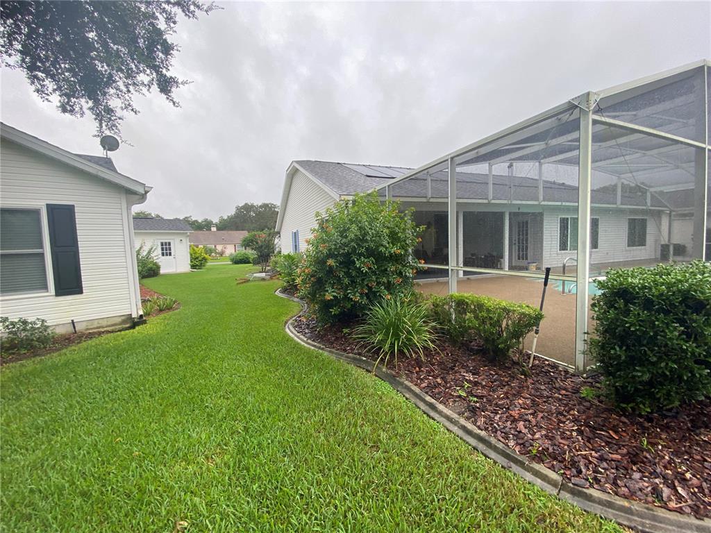 MORE VIEWS OF BIRDCAGE, LANDSCAPING, POOL AREA