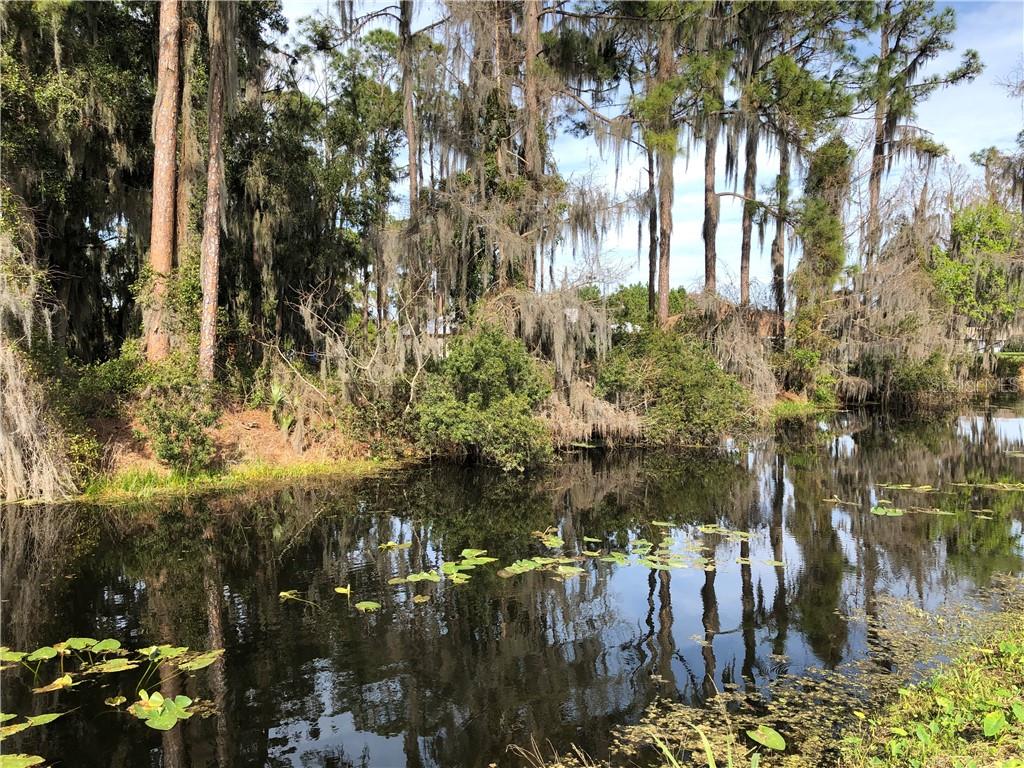 Partial view of listed property from across the canal.