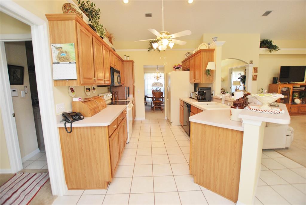 Kitchen. Notice counter open to living room.