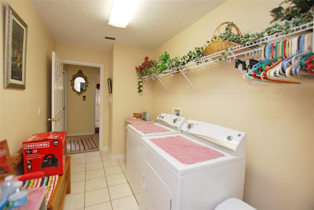 Laundry room. Washer and dryer convey.