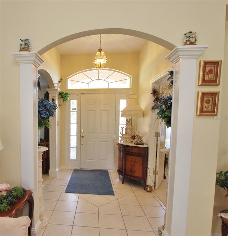 The foyer facing the front door.