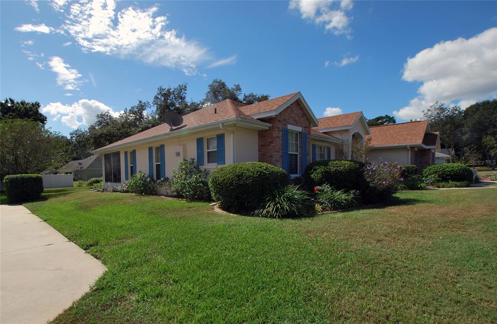 Side view of house and garden from left.