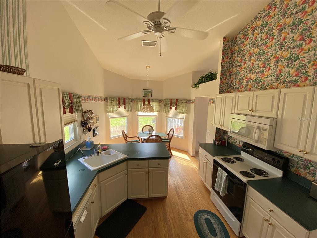 LARGE KITCHEN WITH BEAUTIFUL CABINETS