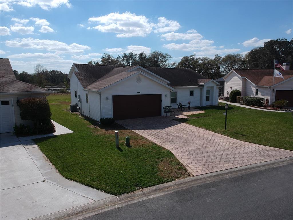 BEAUTIFUL PAVERS INSTALLED IN DRIVEWAY AND SIDEWALK