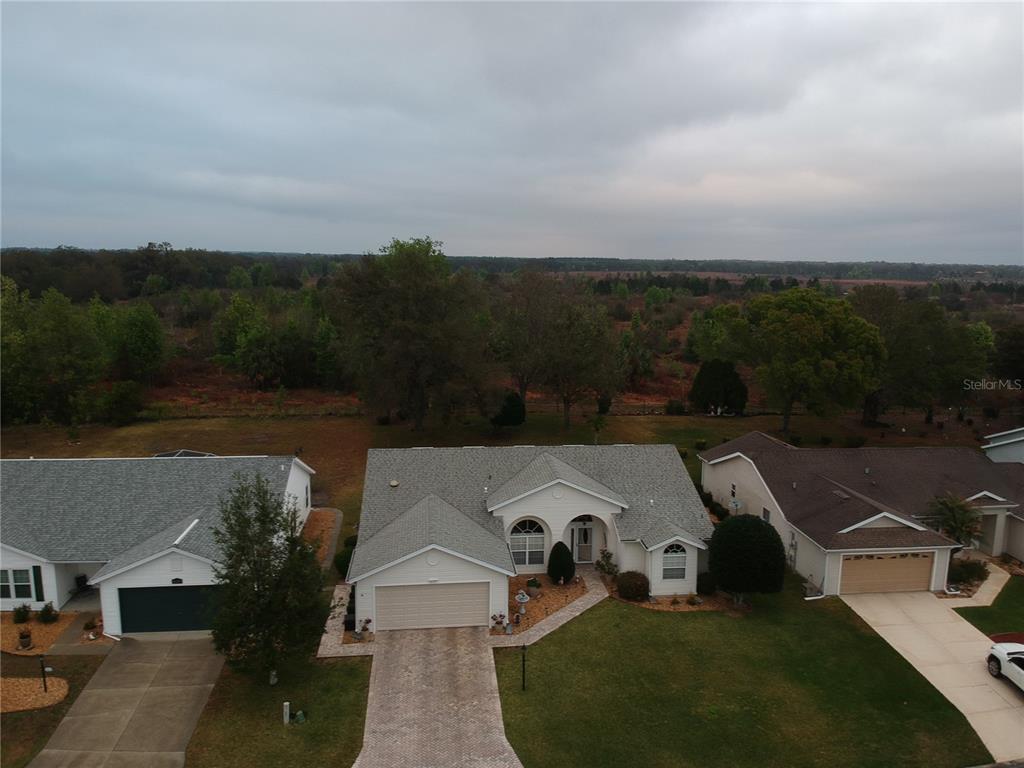 AERIAL VIEWS NOTICE THE PRIVATE REAR LOT