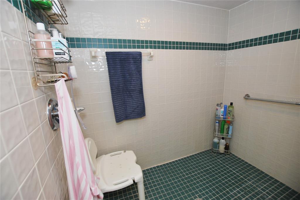 SHOWER IS SPACIOUS ENOUGH TO ENTER A WHEELCHAIR