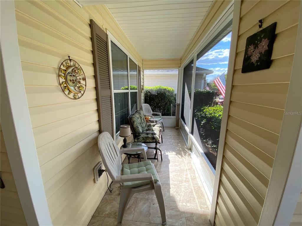 COMFORTABLE SCREENED IN FRONT PORCH