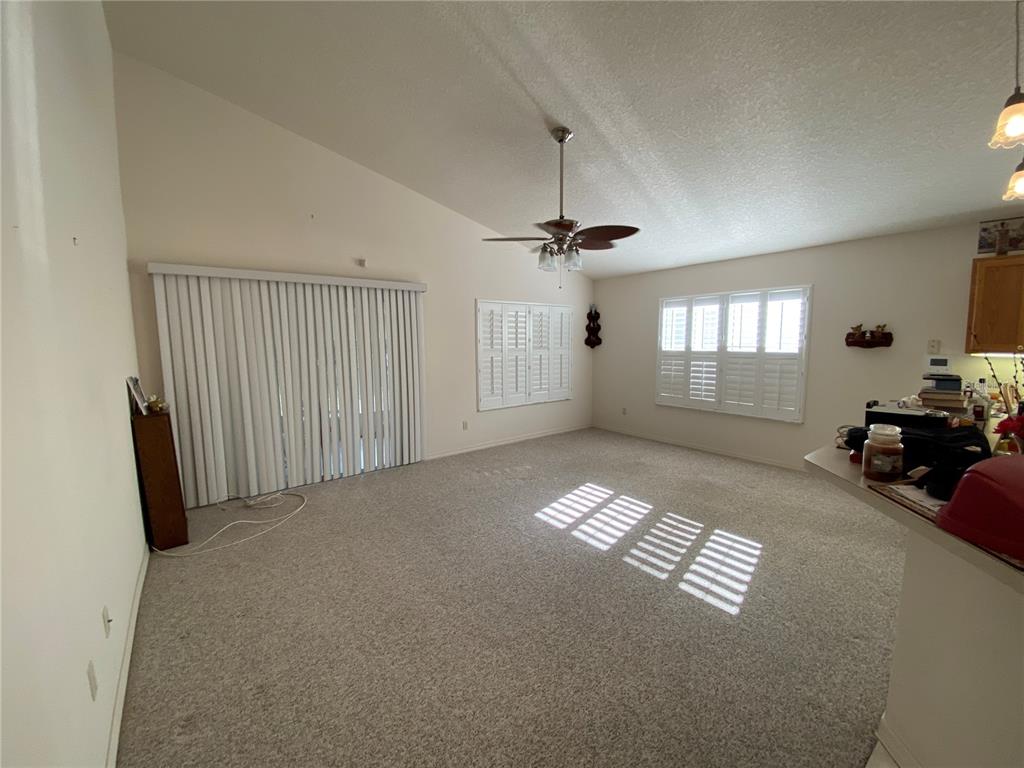 LARGE FAMILY ROOM OFF KITCHEN