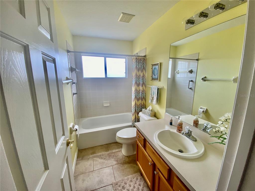 NICE GUEST BATH WITH BATH FITTER TUB AND NEW TILE