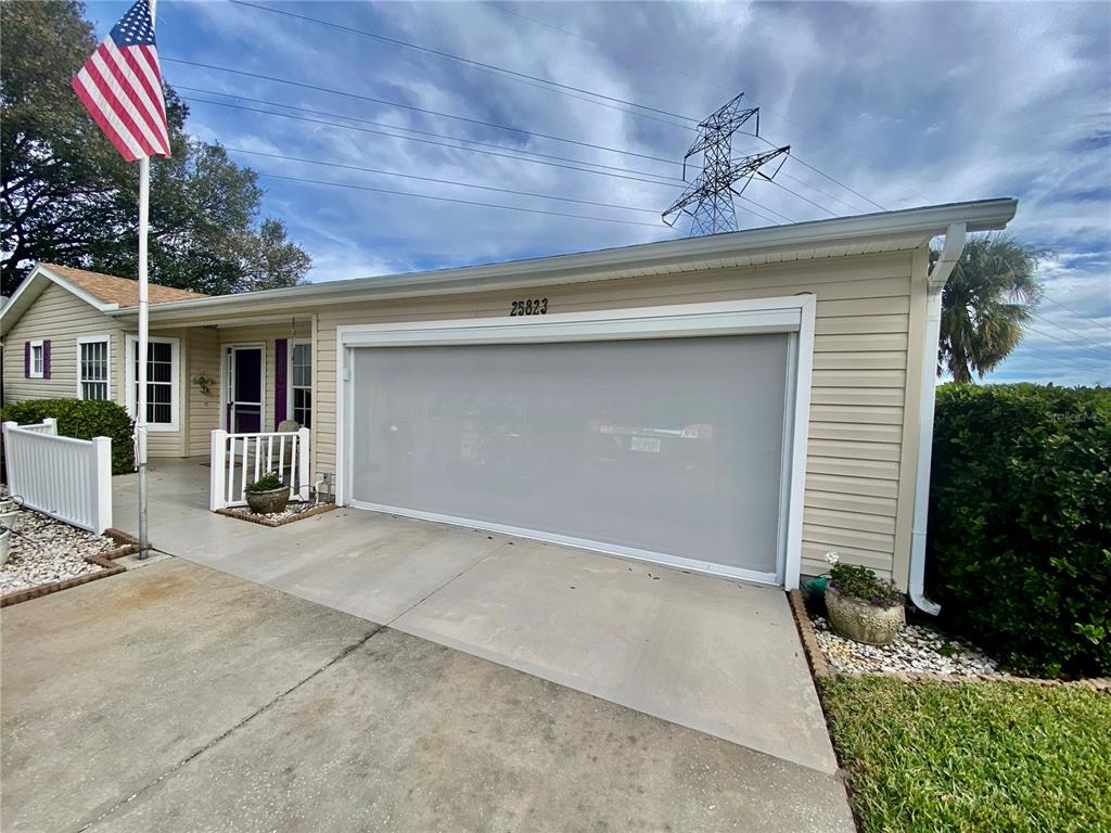 NICE SCREEN DOOR ON GARAGE