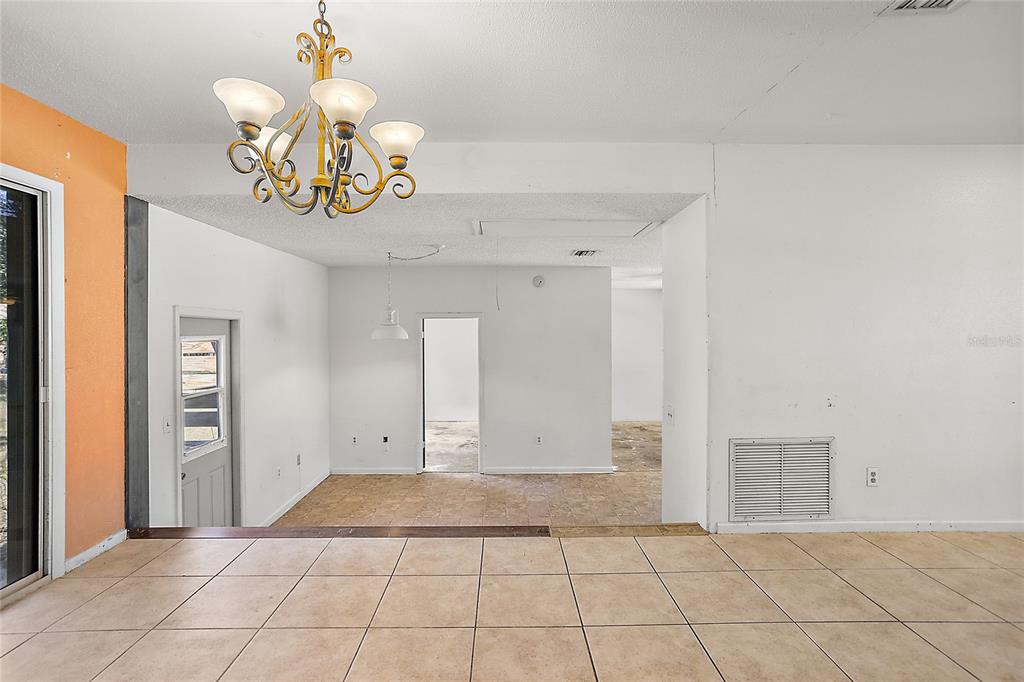 dinette looking to enclosed garage / bonus rooms